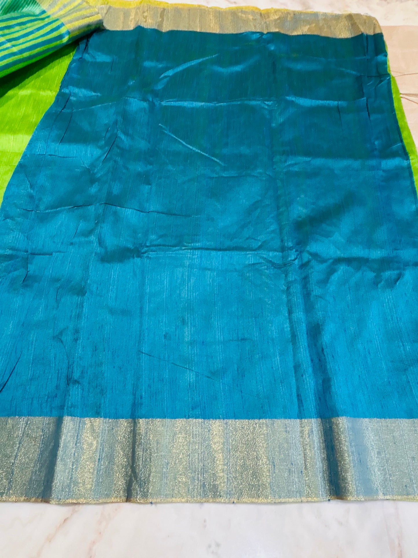 Green Tussar Silk Saree with Zari woven border