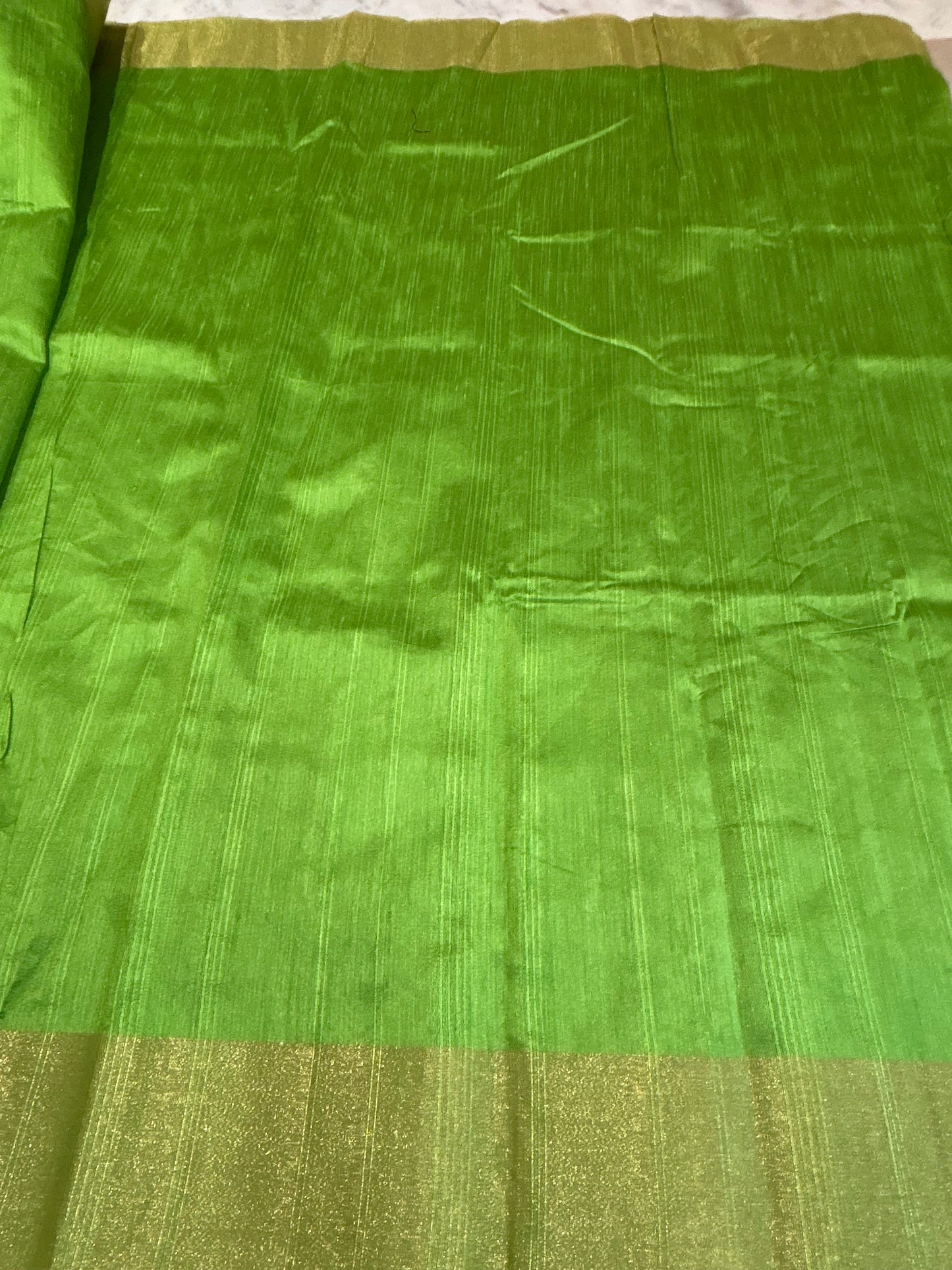 Green Tussar Silk Saree with Zari woven border