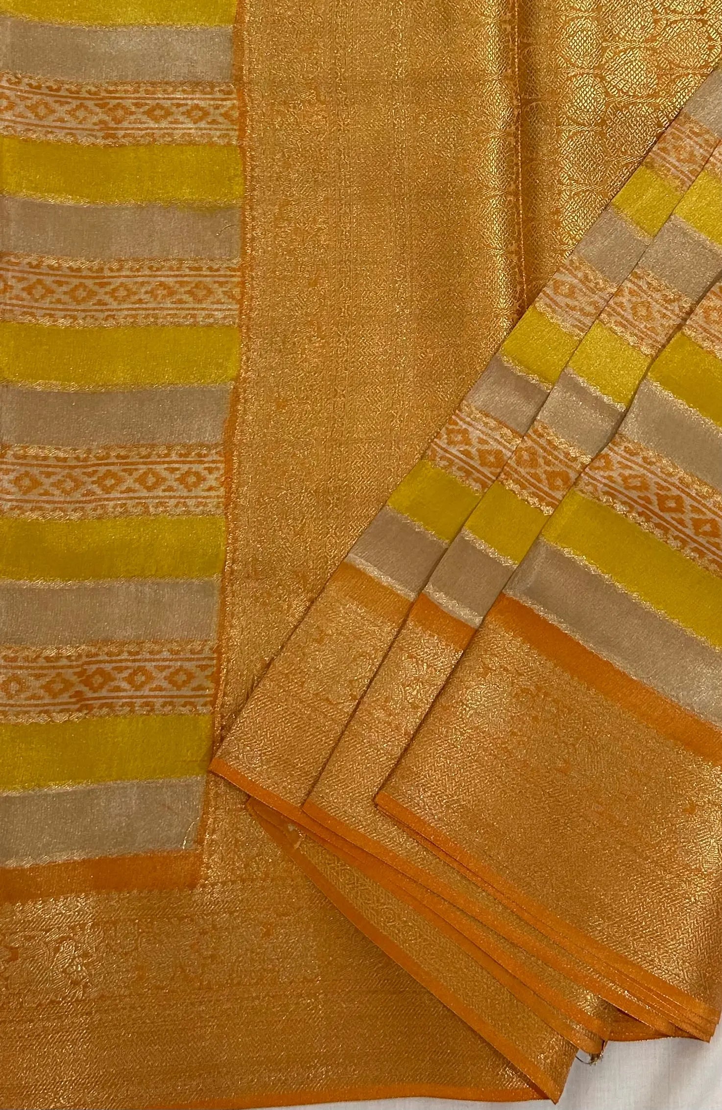 Yellow color Tissue Silk Saree with Zari Border Mandira Silks