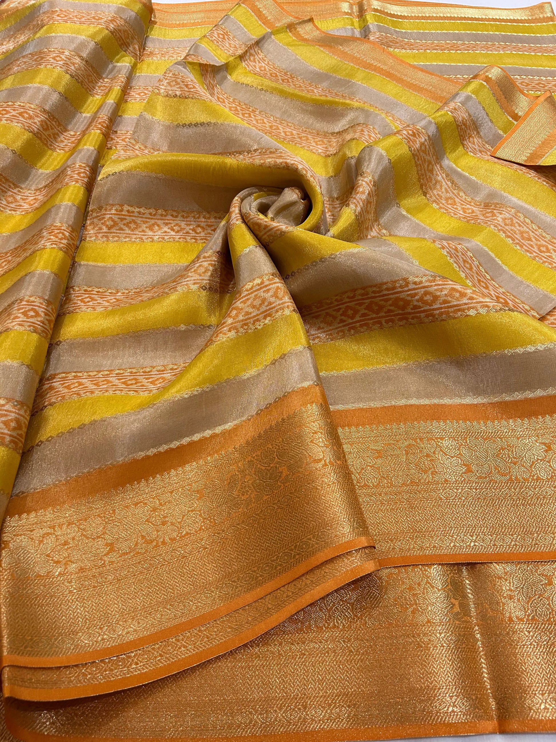 Yellow color Tissue Silk Saree with Zari Border Mandira Silks