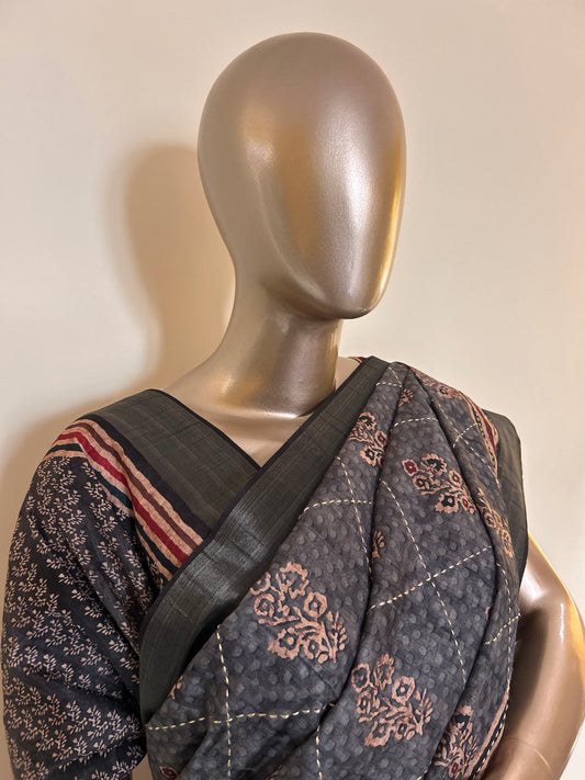 Grey color Tussar saree with Printed design and thread work on the body