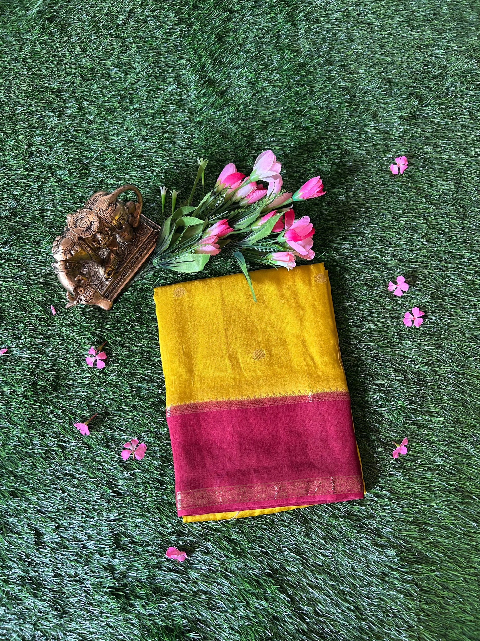Yellow color Dola Silk Saree with purple zari border Mandira Silks