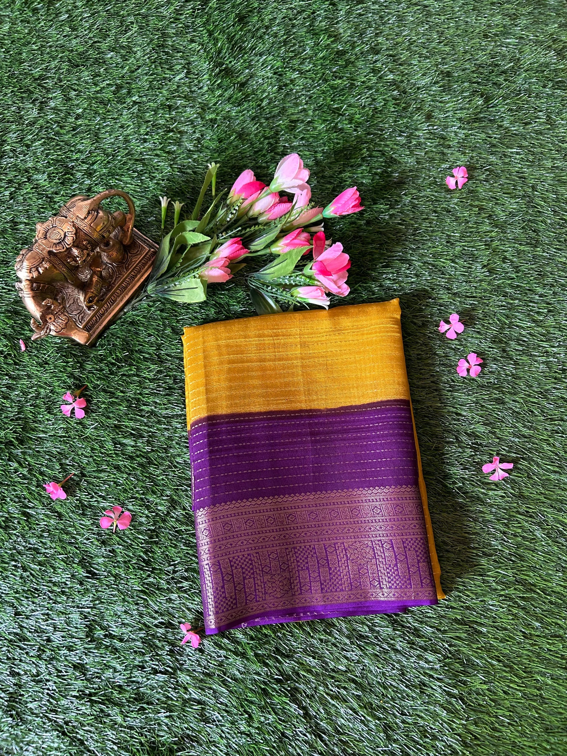 Yellow color Crepe Silk Saree with purple zari border Mandira Silks