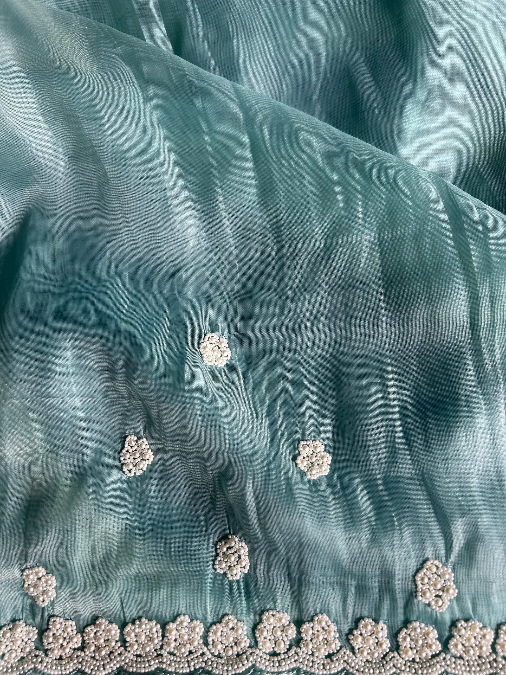 Pale Blue Color netted saree with pearl work Mandira Silks