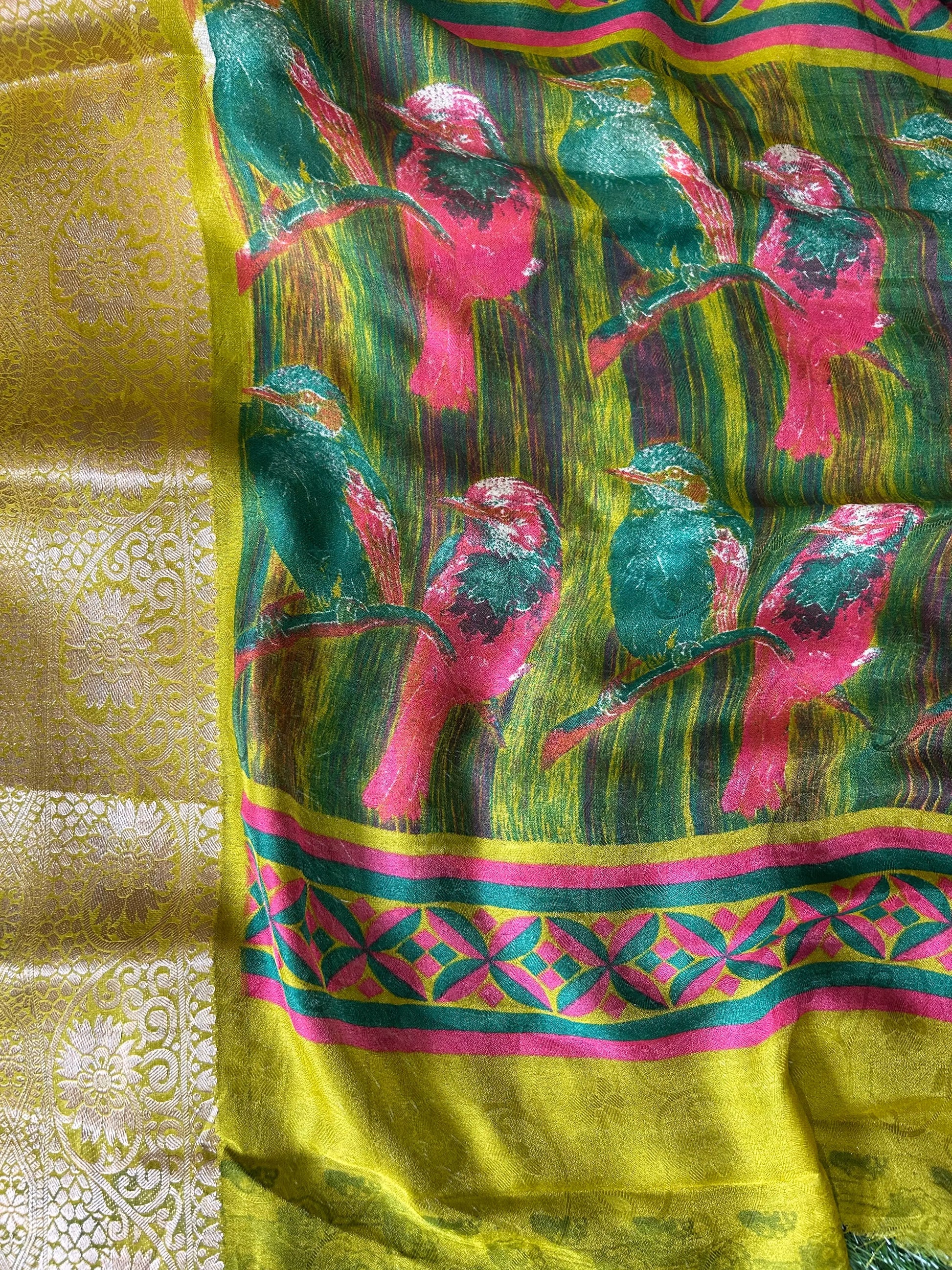 Colorful fabric with floral patterns and geometric designs on a yellow background