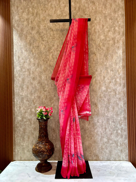 Red saree with floral patterns