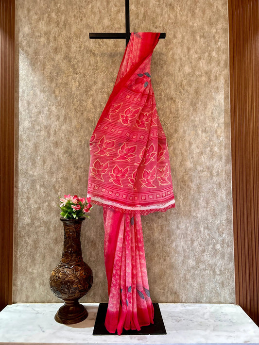 Pink saree with white patterns