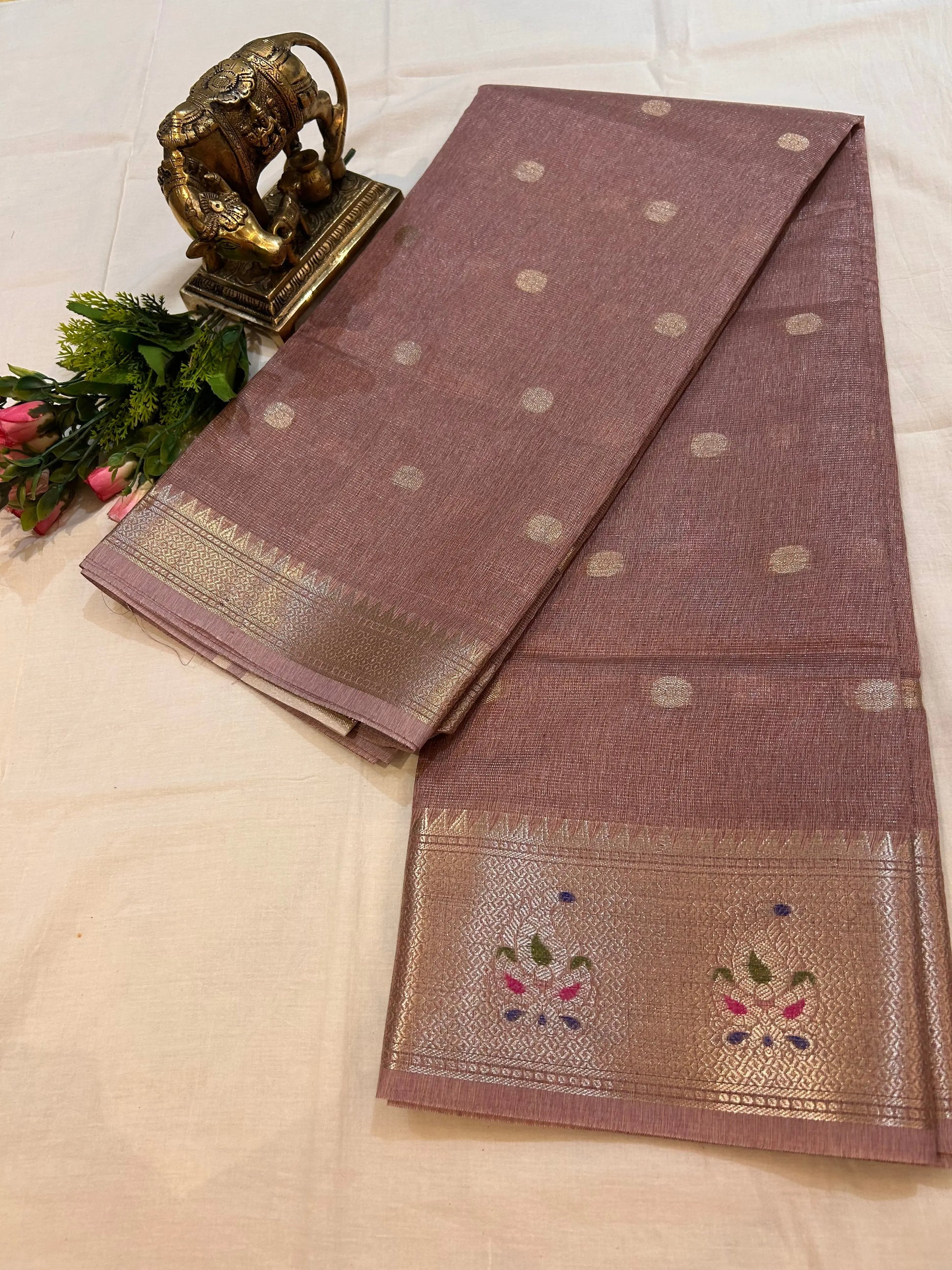Pale Purple color Kota Tissue Saree with Paitani border and buta all over the saree Mandira Silks