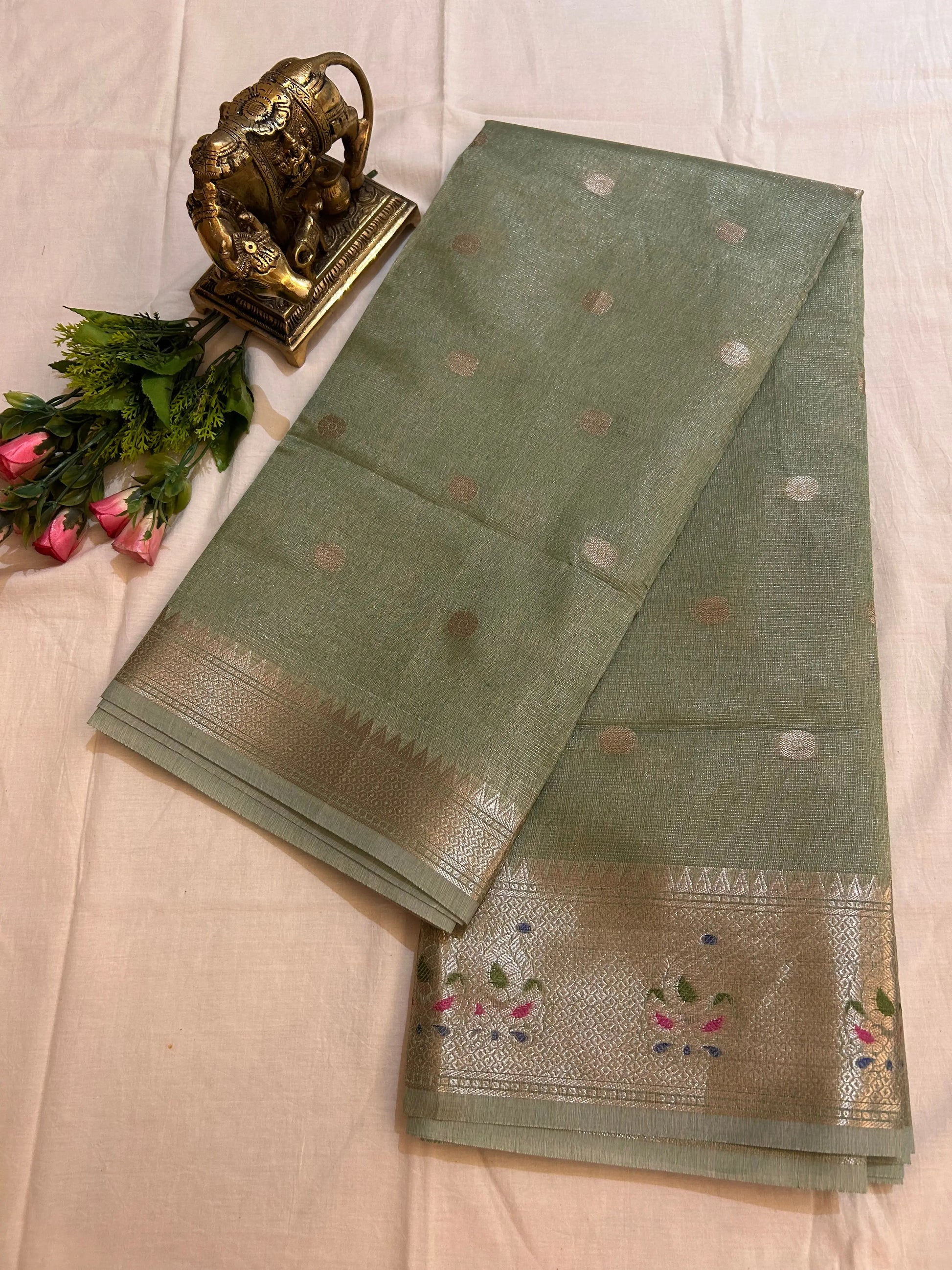 Pista Green Color Kota Tissue Saree with Paitani border, buta all over the saree Mandira Silks